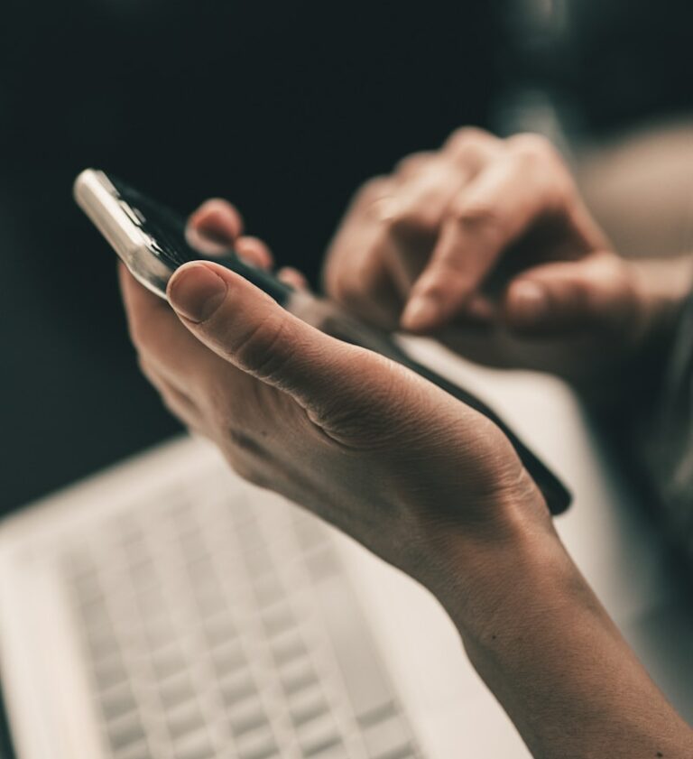person holding black and white pen